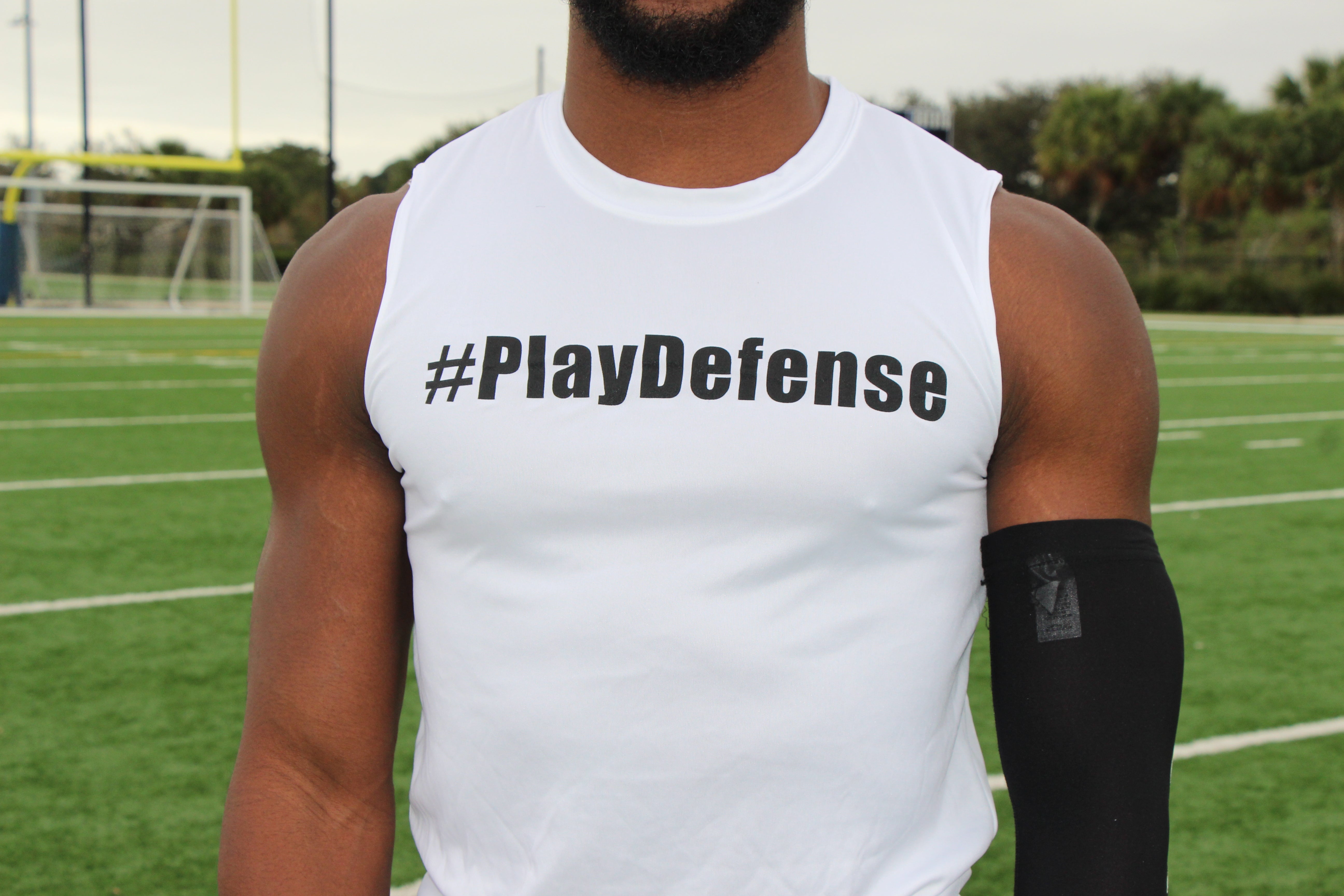 Play Defense Sleeveless Shirt (White)